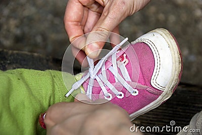 Baby Girl Shoes Size on Home   Royalty Free Stock Images  Tying Baby Shoes